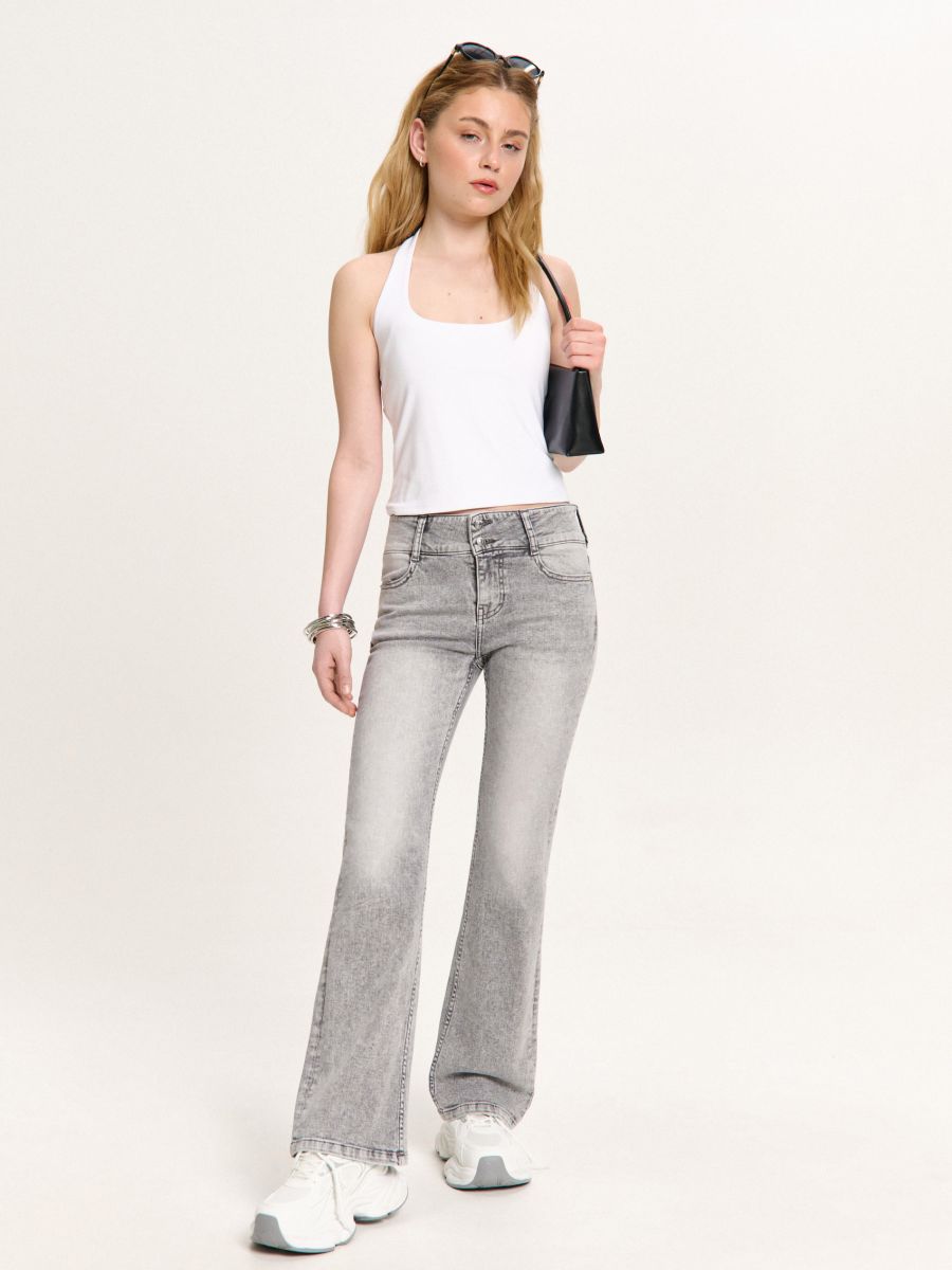 Jasnoszare jeansy bootcut z efektem sprania