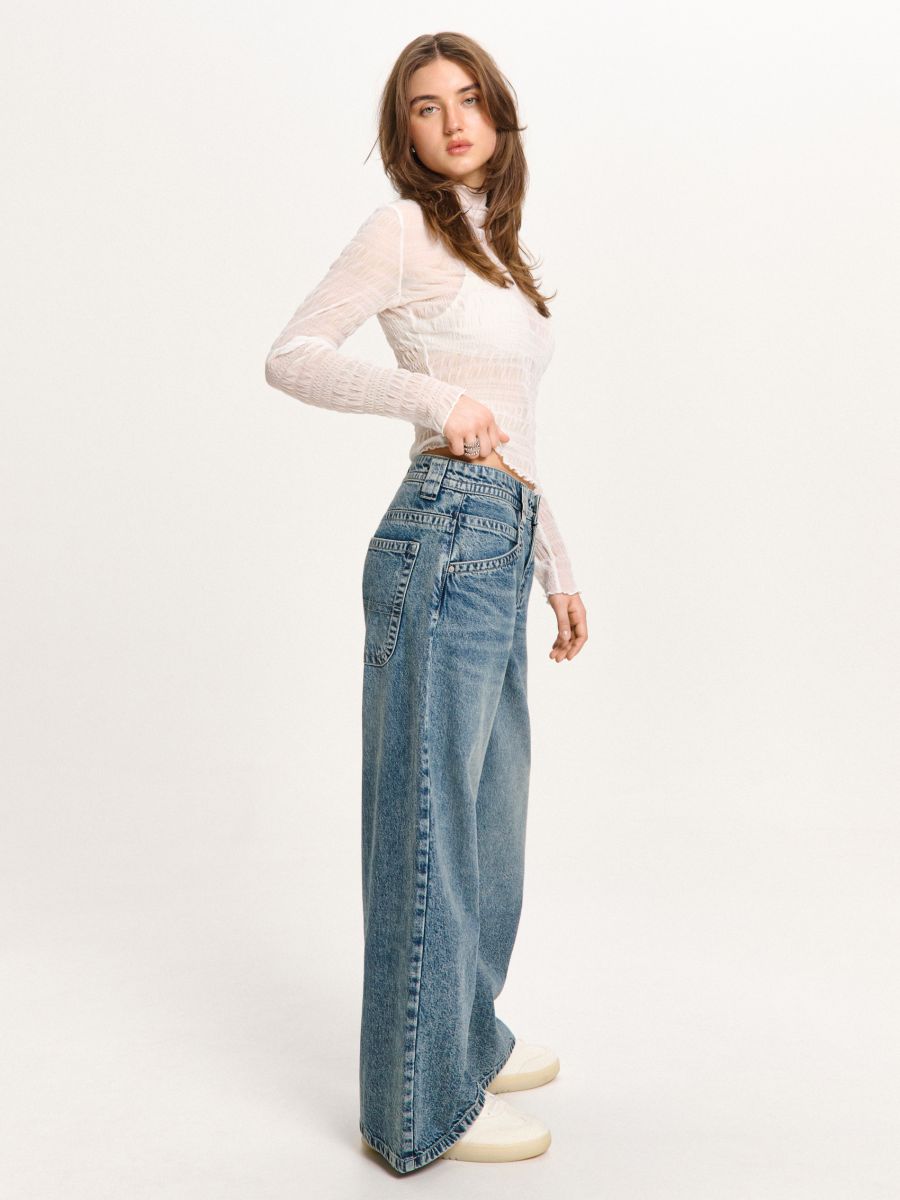 Джинси з ефектом виварювання