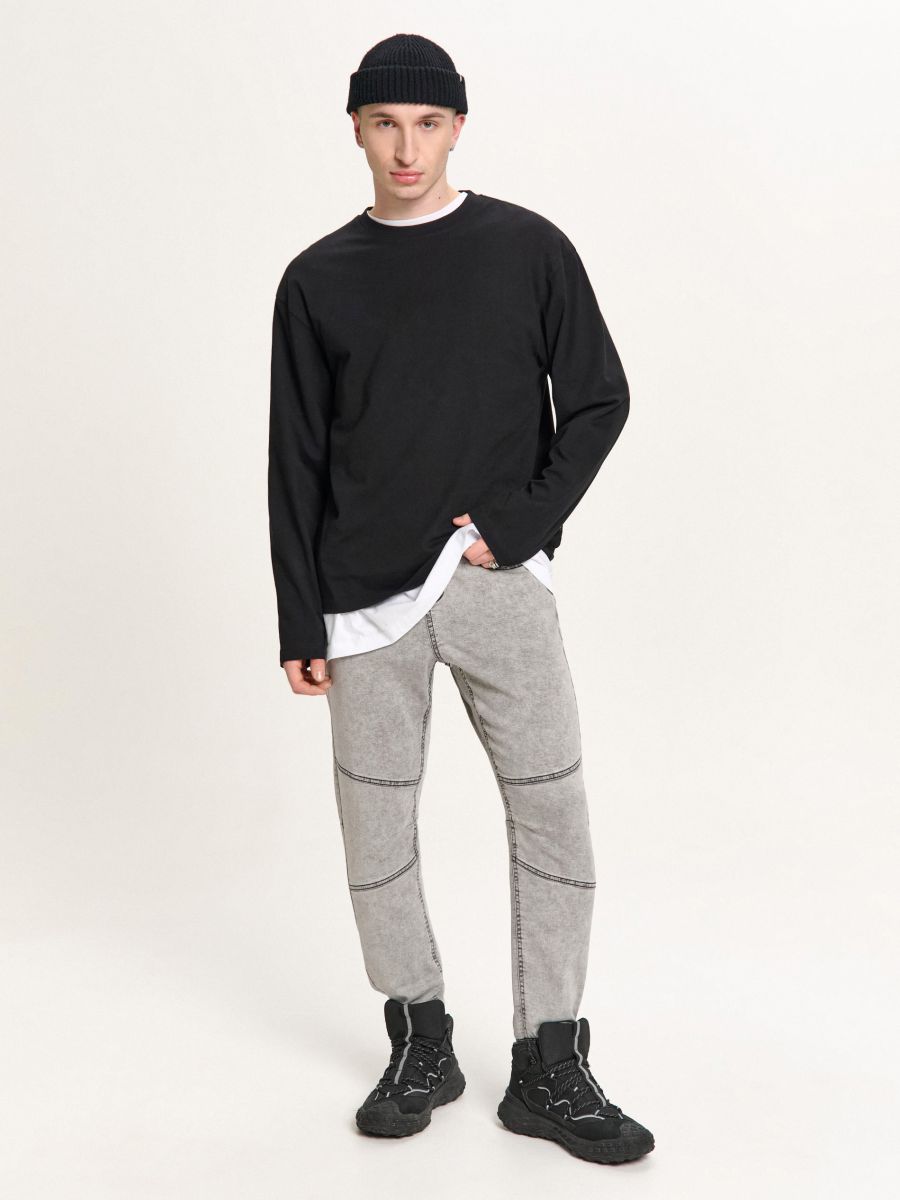 Szare jeansy jogger z efektem sprania