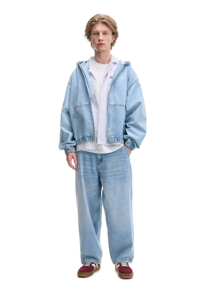 Jeansy skater z tekstową naszywką