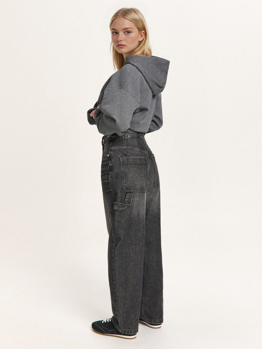 Sprane jeansy skater balloon z paskami