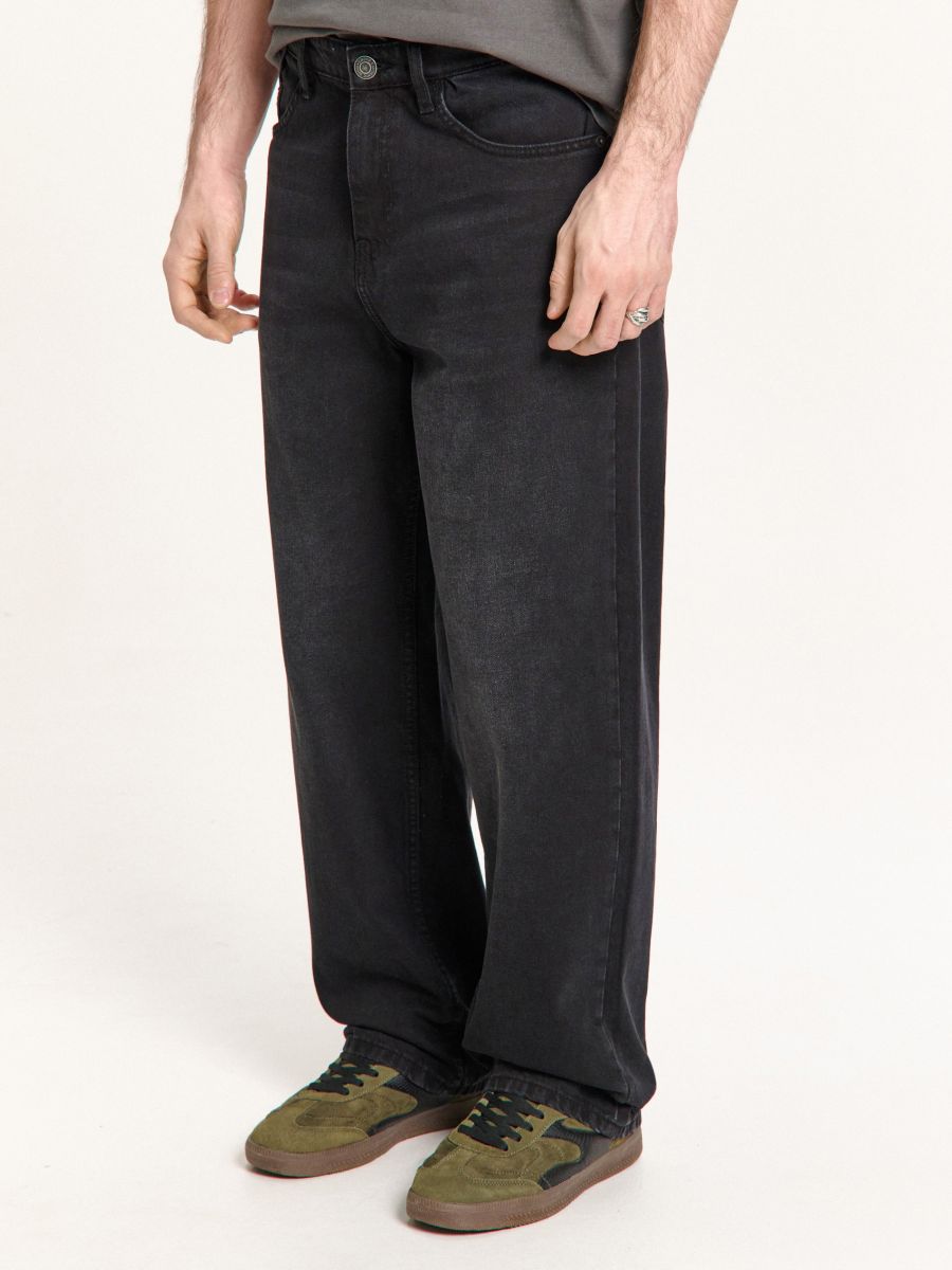 Kulutatud efektiga baggy-teksapüksid