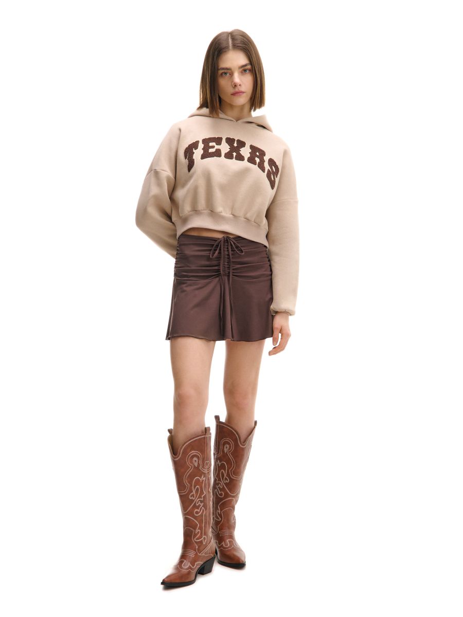 Beżowa bluza z kapturem i napisem TEXAS