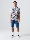 Koszulka polo z nadrukiem all over - biały - CROPP - small1