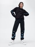 Dresowe joggery z nadrukiem w motyle - czarny - CROPP - small1