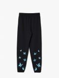Dresowe joggery z nadrukiem w motyle - czarny - CROPP - small6