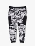 Biało-czarne joggery slim z nadrukiem - biały - CROPP - small6