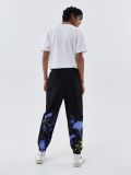 Joggery z nadrukiem all over - czarny - CROPP - small3