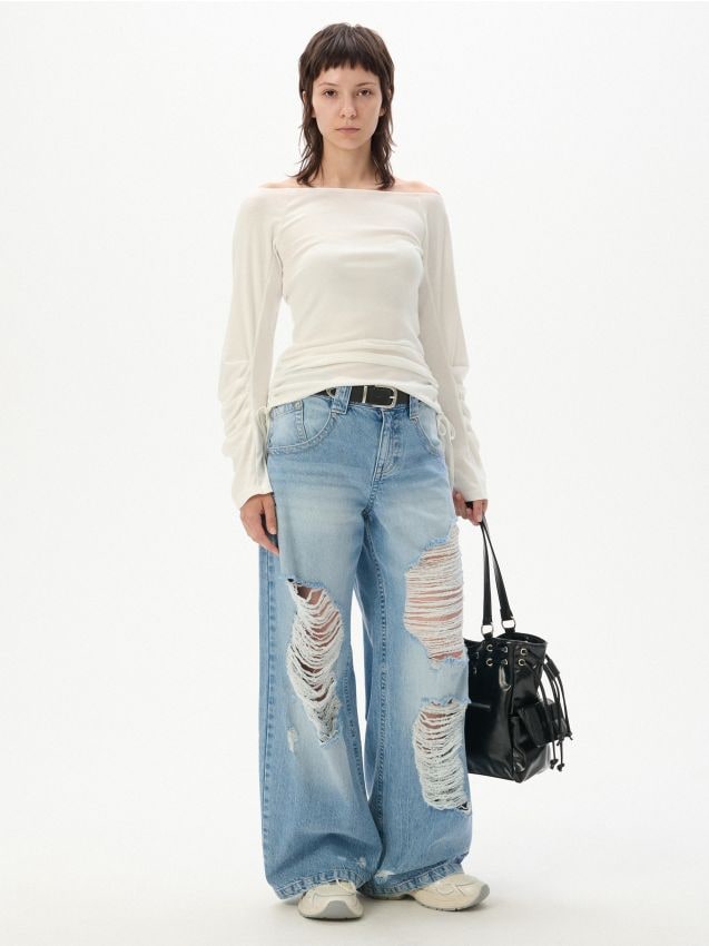 Postrzępione jeansy typu barrel workwear