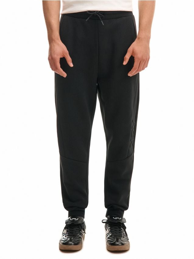 Czarne spodnie loose z kieszeniami cargo - CROPP - 4198W-99X