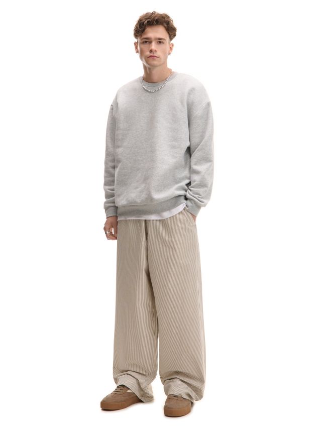 Spodnie baggy w beżowe paski